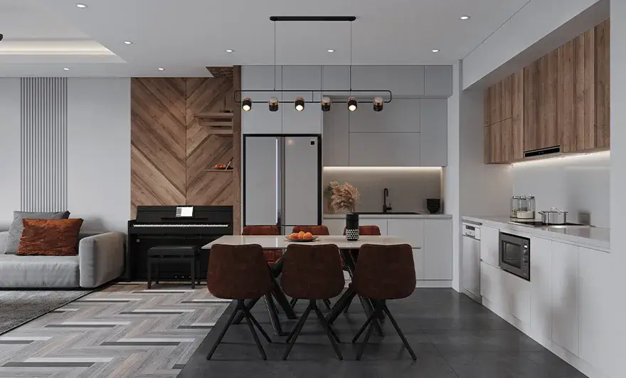 L-shaped modular kitchen design featuring an attached dining table, seamlessly integrated into the space for a functional and stylish home decoration with modern interior ideas.