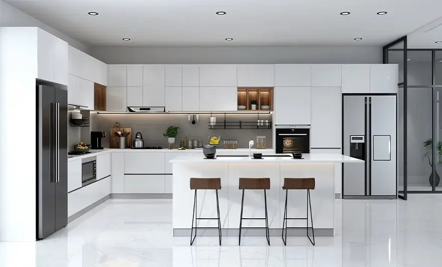 L-shaped modular kitchen design featuring minimalist white cabinetry and stainless steel appliances, offering a clean, functional layout with simple yet modern design elements.